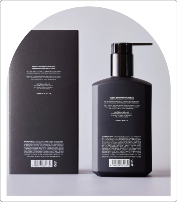 Black conditioner product on grey background