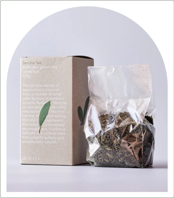 Organic tea product on a grey background