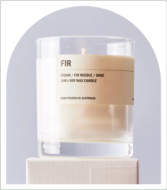 Candle on grey background